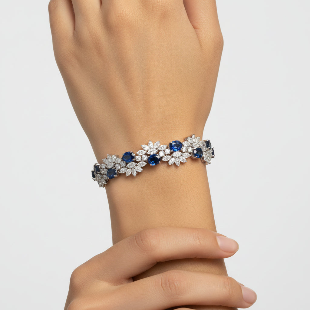 Floral Cluster Gemstone Tennis Bracelet with sapphire stones worn on the wrist