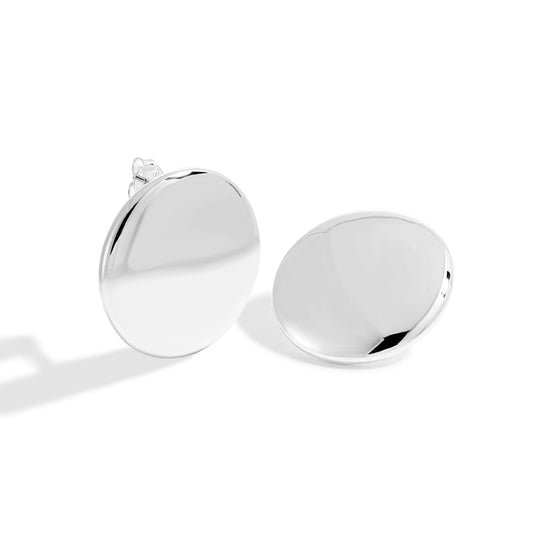 Organic Disc Stud Earrings in 999 fine silver. Softly irregular discs with gently contoured polished surfaces.
