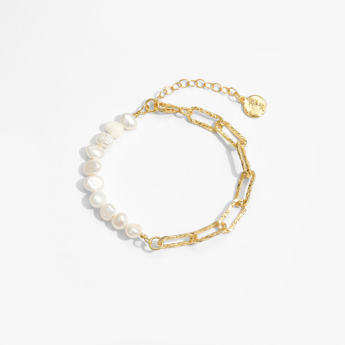 Pearl and Paperclip Chain Bracelet in 925 sterling silver. A pearl row meets open paperclip links in an asymmetric bracelet.