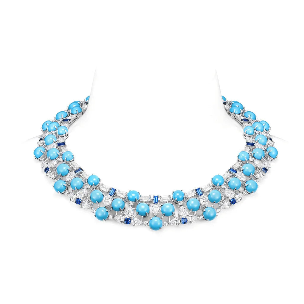 Turquoise and silver collarbone necklace detail