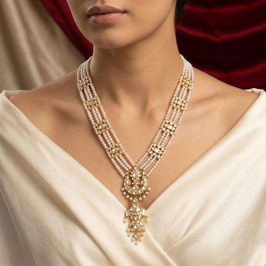 Model wearing Polki pearl rani haar long necklace with chandbali drop pendant