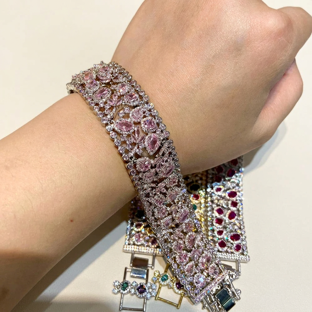 Pink cubic zirconia bracelet worn on a wrist