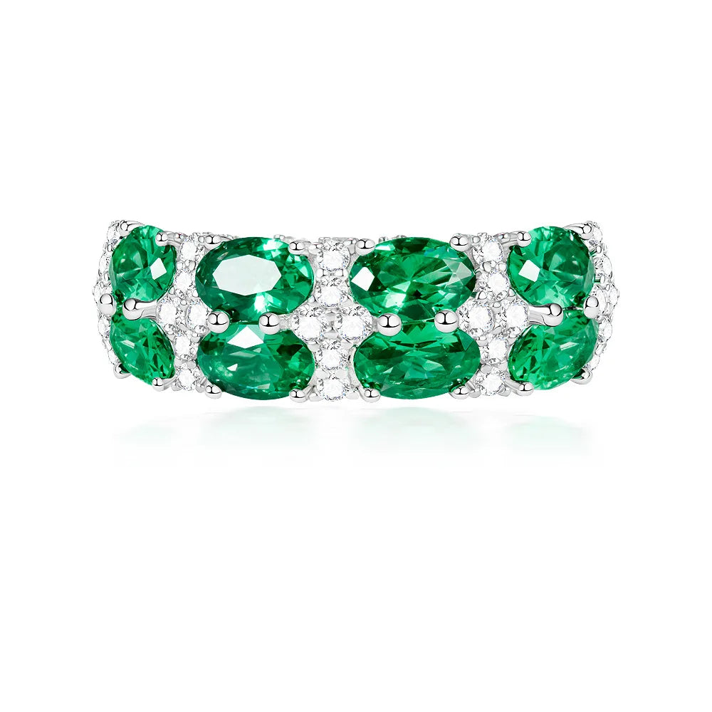 Emerald green eternity band silver ring, close-up - Ratnali Jewels