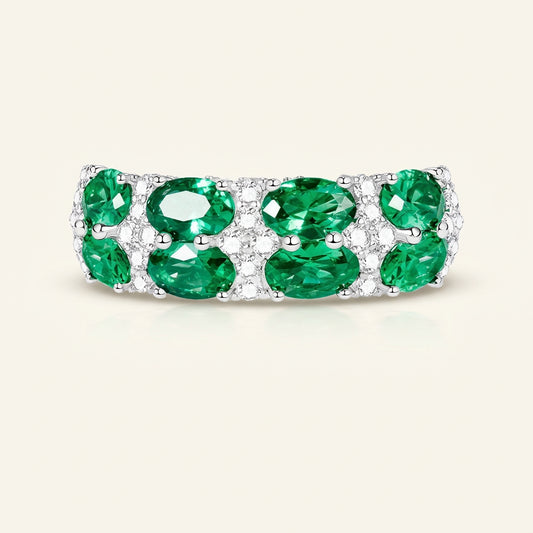 Emerald green eternity band silver ring, close-up - Ratnali Jewels