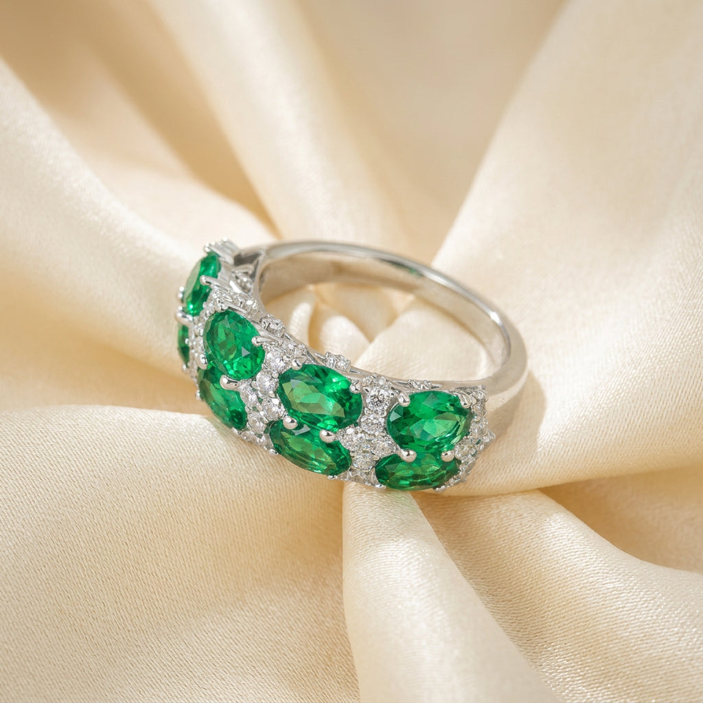 Emerald green eternity band silver ring, angled view - Ratnali Jewels