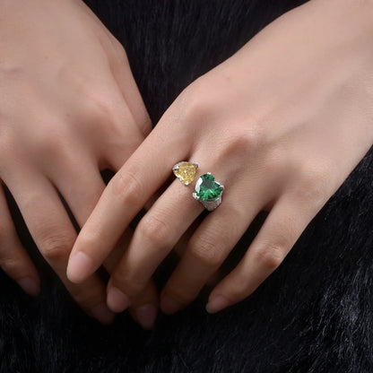 Emerald and yellow heart toi et moi silver ring, angled view - Ratnali Jewels