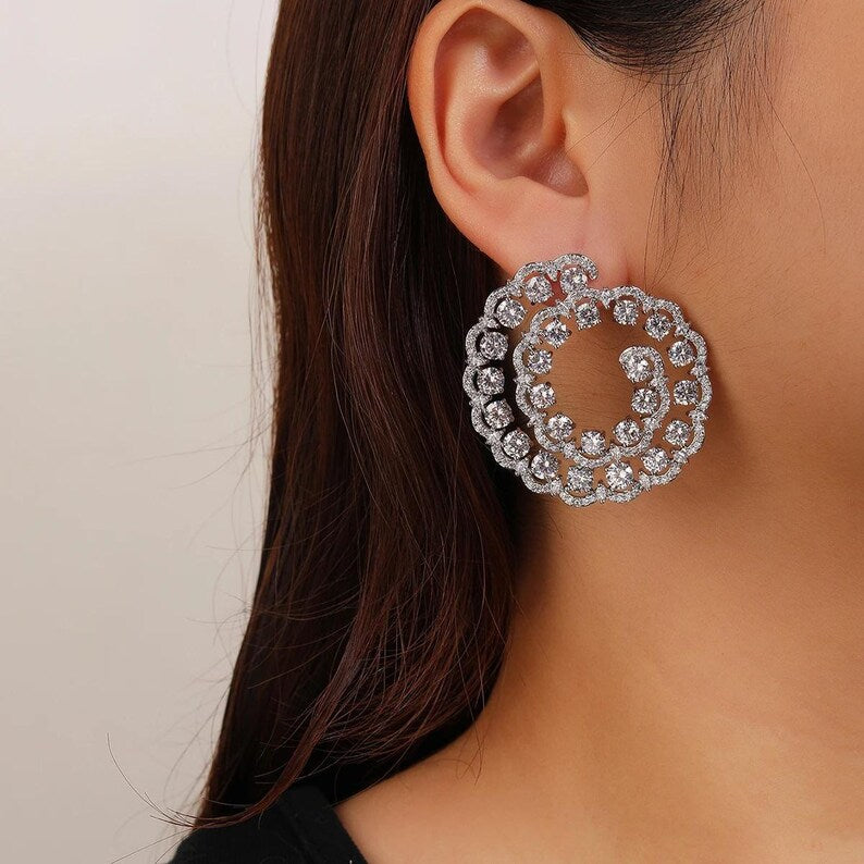 Swirl design statement earrings close up - Ratnali Jewels