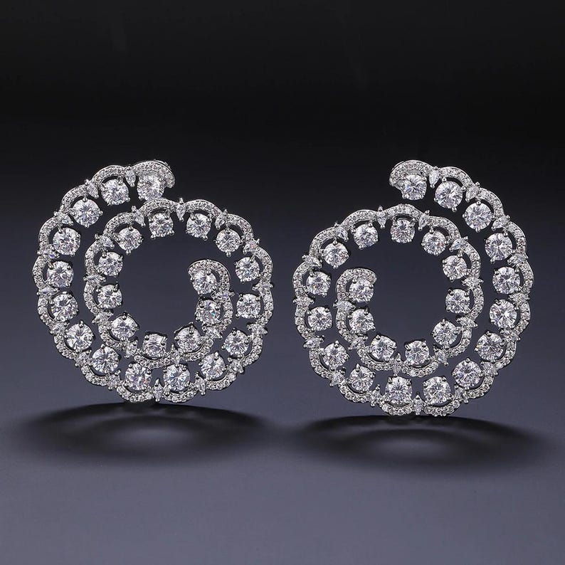 Swirl design statement earrings side view - Ratnali Jewels