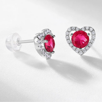 Ruby heart halo stud earrings showing push backs