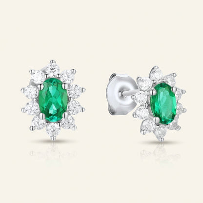 Lab grown emerald oval halo stud earrings in sterling silver