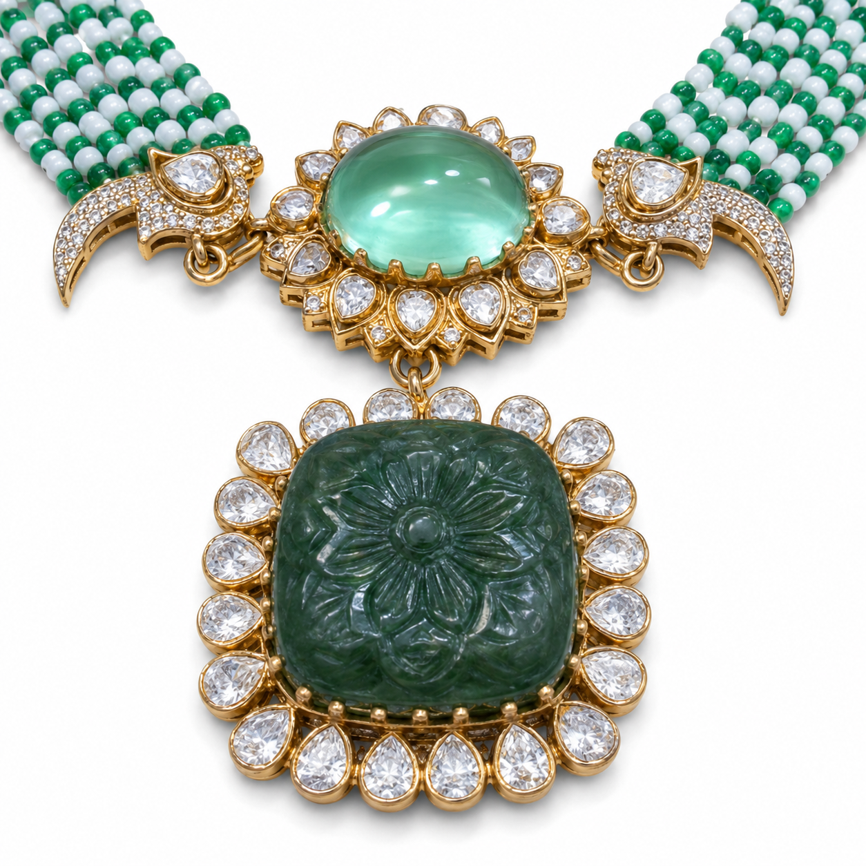 Close-up of hand-carved emerald flower pendant with Moissanite Polki halo