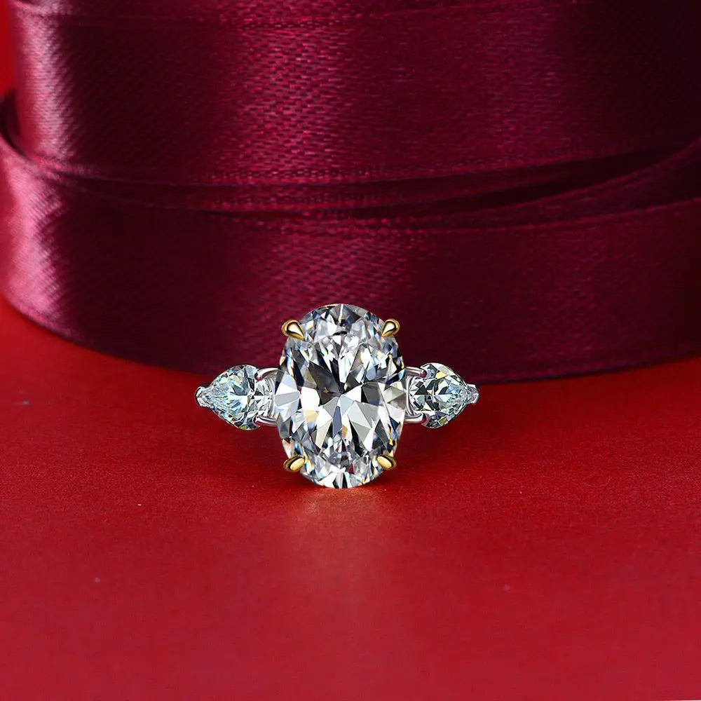 White oval cut simulated diamond silver ring on red fabric - Ratnali Jewels