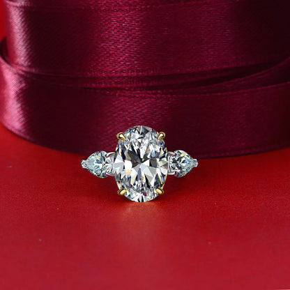 White oval cut simulated diamond silver ring on red fabric - Ratnali Jewels