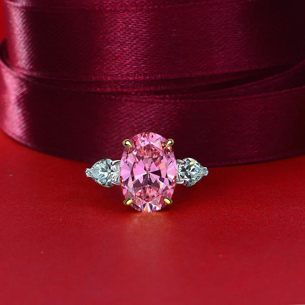 Pink oval cut simulated diamond silver ring on red fabric - Ratnali Jewels