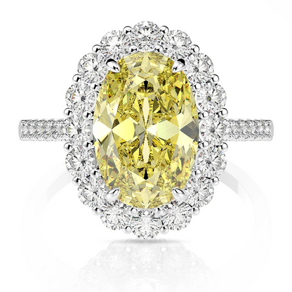 Yellow oval statement silver ring, close-up studio shot - Ratnali Jewels