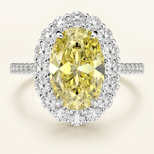 Yellow oval statement silver ring, close-up studio shot - Ratnali Jewels