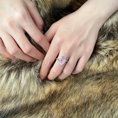 Pink teardrop solitaire silver ring worn on hand - Ratnali Jewels