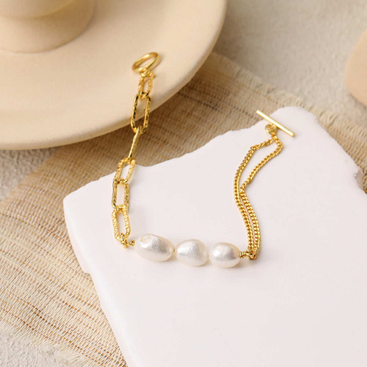 Baroque Pearl Mixed Link Bracelet in 925 sterling silver. Three baroque pearls meet contrasting links and a toggle clasp.