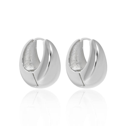 Bold U Hoop Earrings in 925 sterling silver. Broad U curves and polished surfaces give these hoops presence.