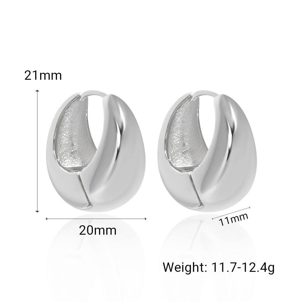 Bold U Hoop Earrings in 925 sterling silver. Broad U curves and polished surfaces give these hoops presence.