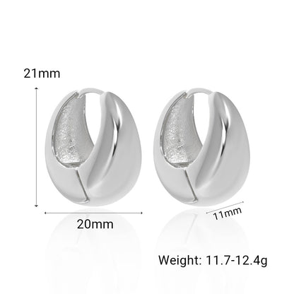 Bold U Hoop Earrings in 925 sterling silver. Broad U curves and polished surfaces give these hoops presence.