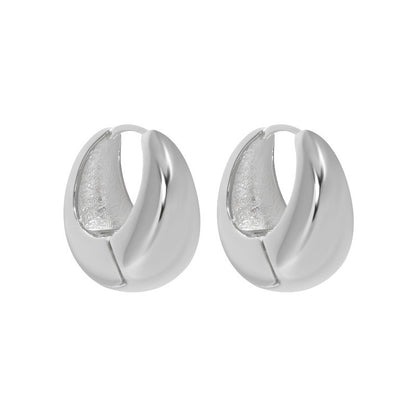 Bold U Hoop Earrings in 925 sterling silver. Broad U curves and polished surfaces give these hoops presence.