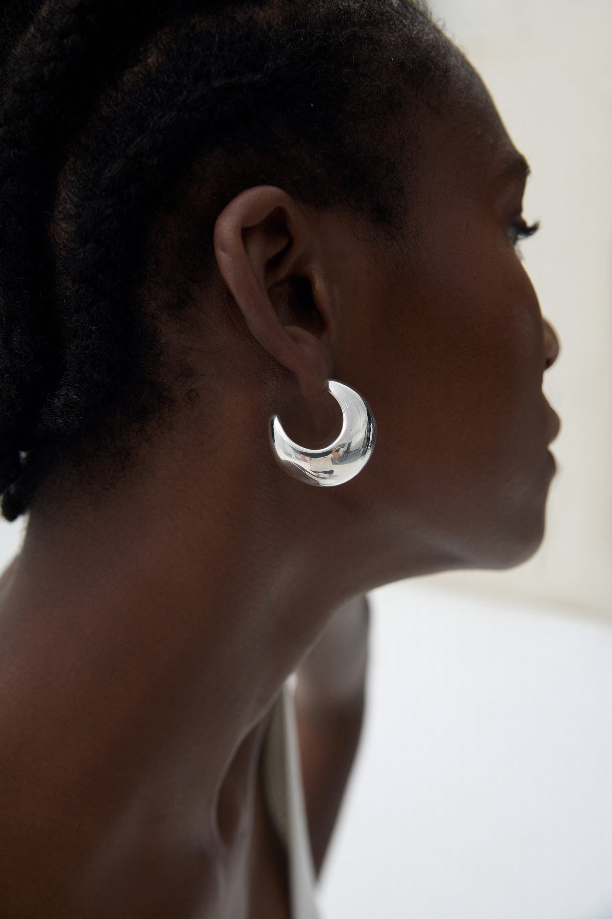 Crescent Sculptural Earrings in 999 fine silver. Full crescent curves finished with 18k Yellow Gold plating.