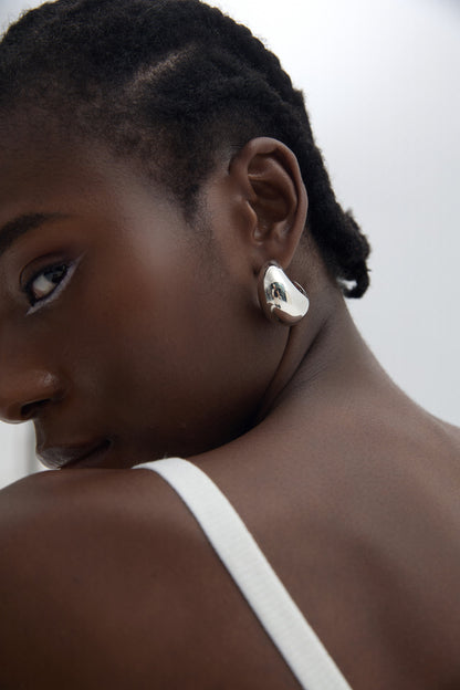 Crescent Sculptural Earrings in 999 fine silver. Full crescent curves finished with 18k Yellow Gold plating.