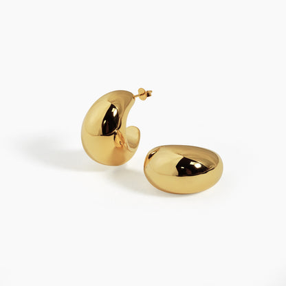 Crescent Sculptural Earrings in 999 fine silver. Full crescent curves finished with 18k Yellow Gold plating.