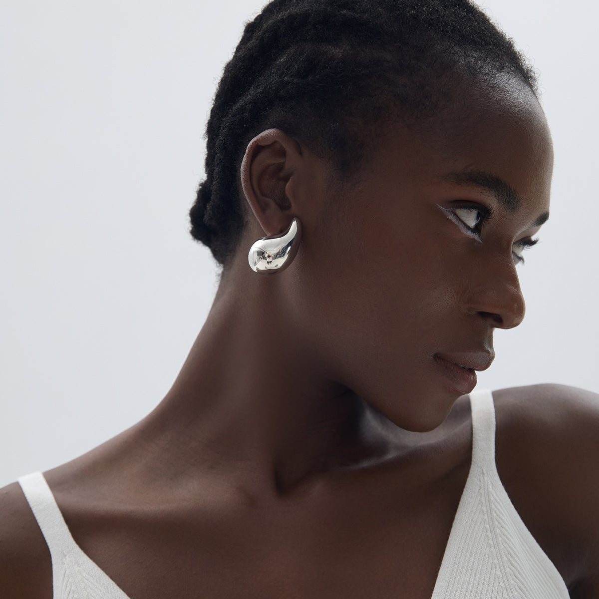 Large Sculptural Teardrop Earrings in 999 fine silver. Generous polished teardrops bring sculptural volume to the ear.