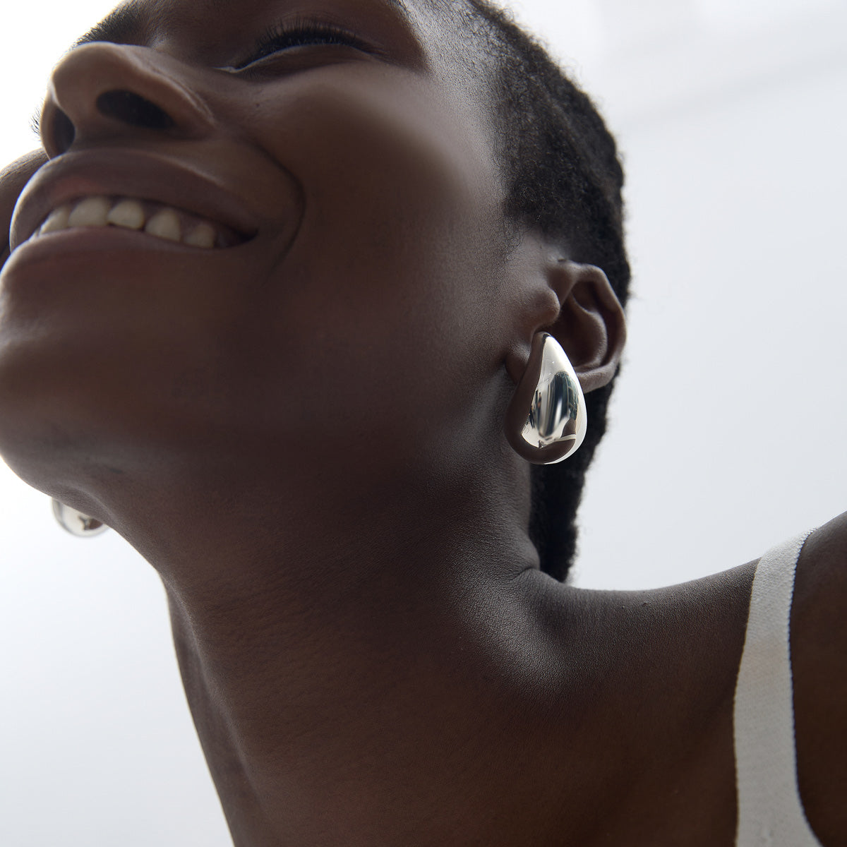 Large Sculptural Teardrop Earrings in 999 fine silver. Generous polished teardrops bring sculptural volume to the ear.