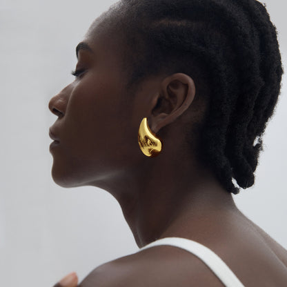 Large Sculptural Teardrop Earrings in 999 fine silver. Generous polished teardrops bring sculptural volume to the ear.