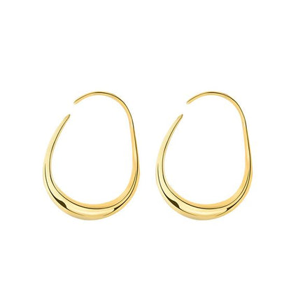 Open Teardrop Hoop Earrings in 925 sterling silver. Elongated open teardrops create a fluid outline at the ear.