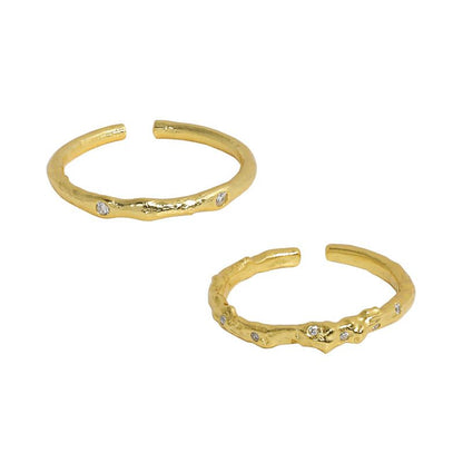 Organic Accent Open Ring in 925 sterling silver. An organic slim band with cubic zirconia accents in two profiles.