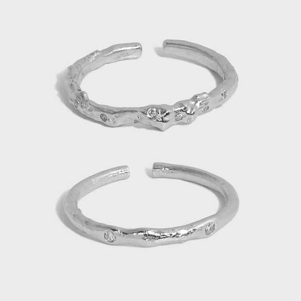 Organic Accent Open Ring in 925 sterling silver. An organic slim band with cubic zirconia accents in two profiles.