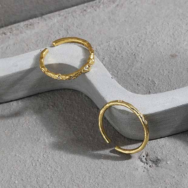 Organic Accent Open Ring in 925 sterling silver. An organic slim band with cubic zirconia accents in two profiles.