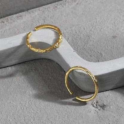 Organic Accent Open Ring in 925 sterling silver. An organic slim band with cubic zirconia accents in two profiles.