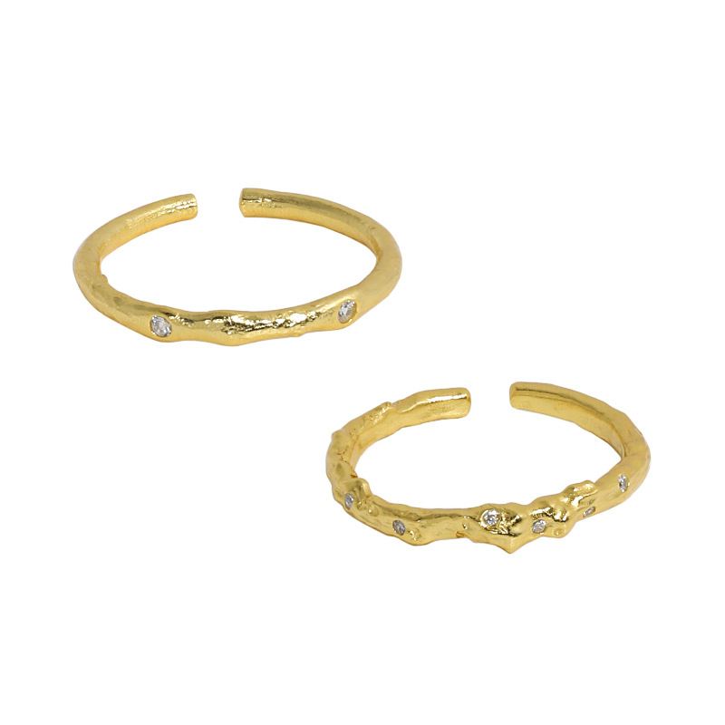 Organic Accent Open Ring in 925 sterling silver. An organic slim band with cubic zirconia accents in two profiles.