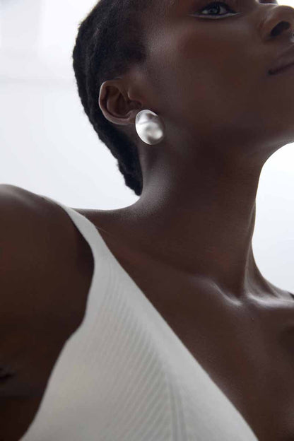 Organic Oval Stud Earrings in 999 fine silver. Generous irregular ovals with softly rounded polished surfaces.
