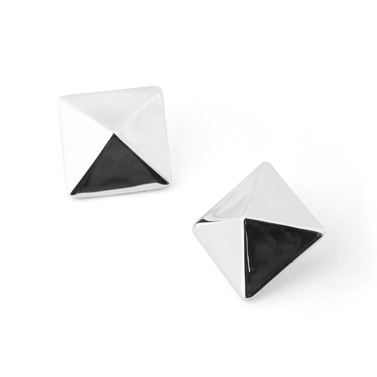 Origami Pyramid Stud Earrings in 999 fine silver. Folded planes create a geometric pyramid with crisp reflections.