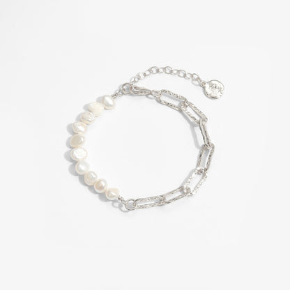 Pearl and Paperclip Chain Bracelet in 925 sterling silver. A pearl row meets open paperclip links in an asymmetric bracelet.