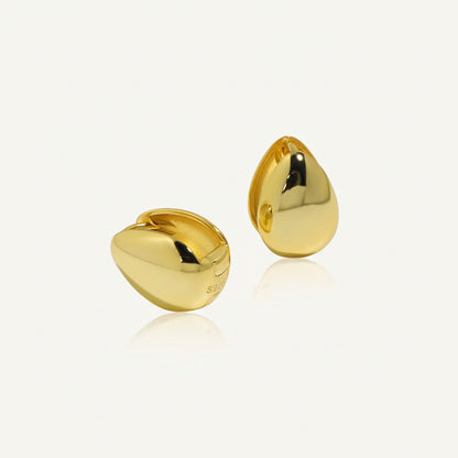 Petite Teardrop Hoop Earrings in 925 sterling silver. Petite teardrop hoops with smooth curves and compact proportions.