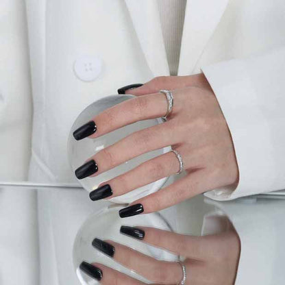 Rectangle Accent Open Ring in 925 sterling silver. A rectangular cubic zirconia accents a textured adjustable band.