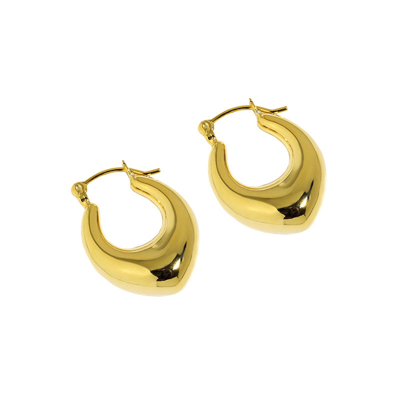 Rounded U Hoop Earrings in 925 sterling silver. Full rounded U curves bring a sculptural finish to everyday hoops.