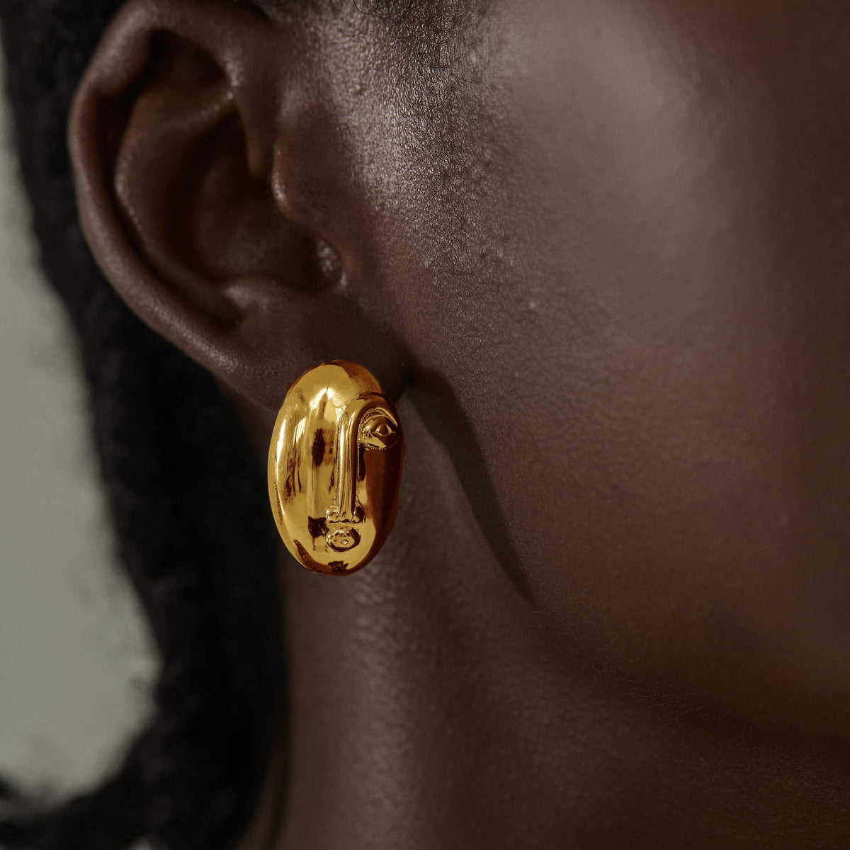 Sculpted Oval Stud Earrings in 999 fine silver. Elongated organic ovals with a reflective sculpted surface.