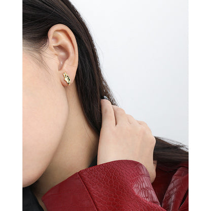 Sculpted Pod Stud Earrings in 925 sterling silver. Polished pod shapes with gently uneven, organic contours.