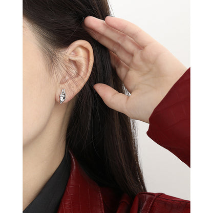 Sculpted Pod Stud Earrings in 925 sterling silver. Polished pod shapes with gently uneven, organic contours.