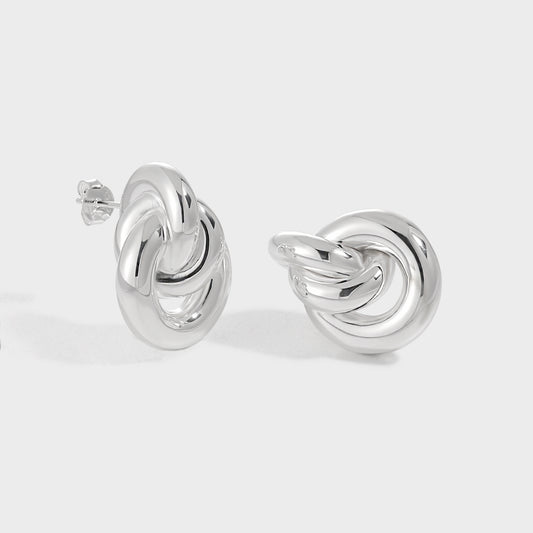Triple Loop Knot Stud Earrings in 999 fine silver. Three interwoven loops create a rounded, polished knot.