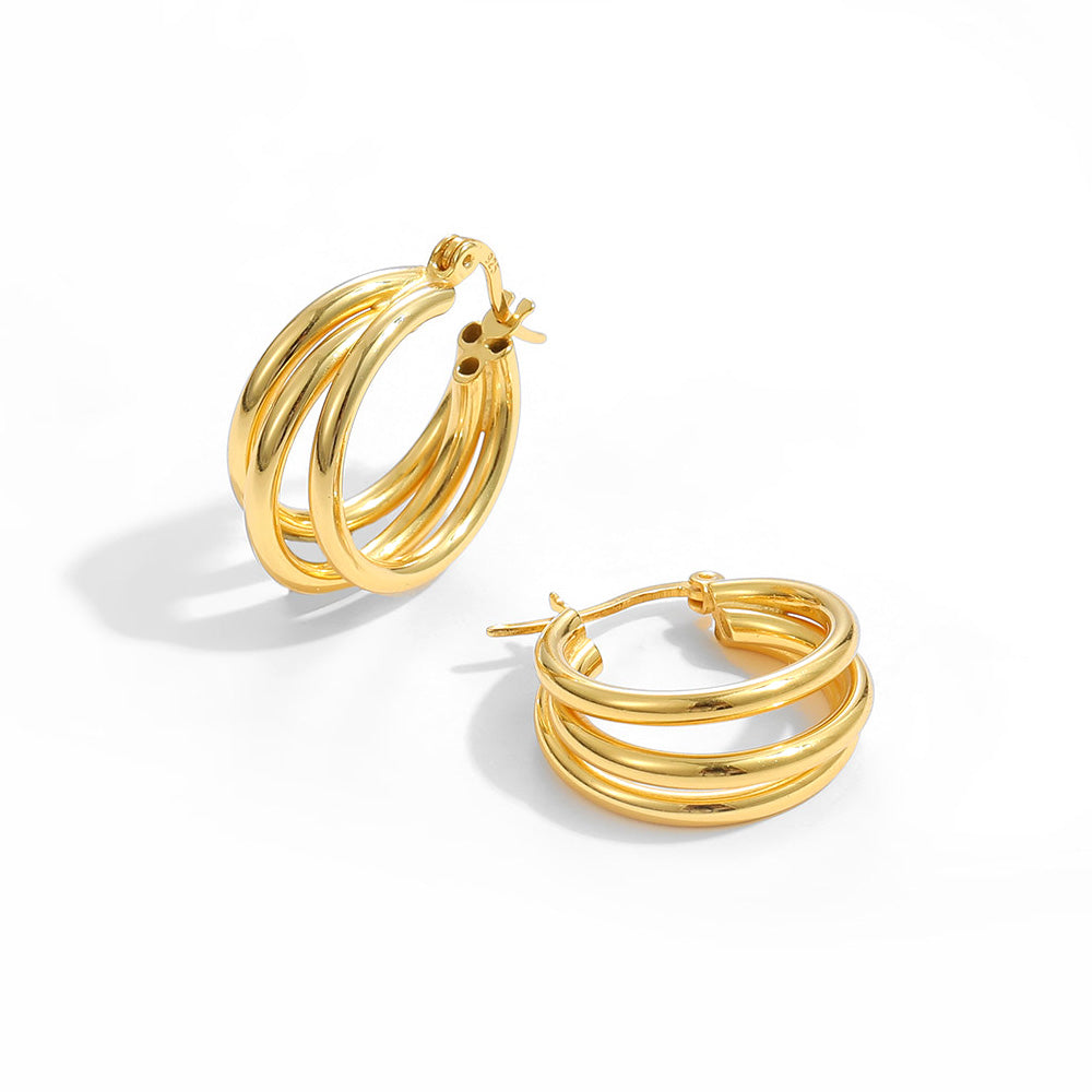 Triple Row Hoop Earrings in 925 sterling silver. Three open rows create a layered hoop with a polished finish.