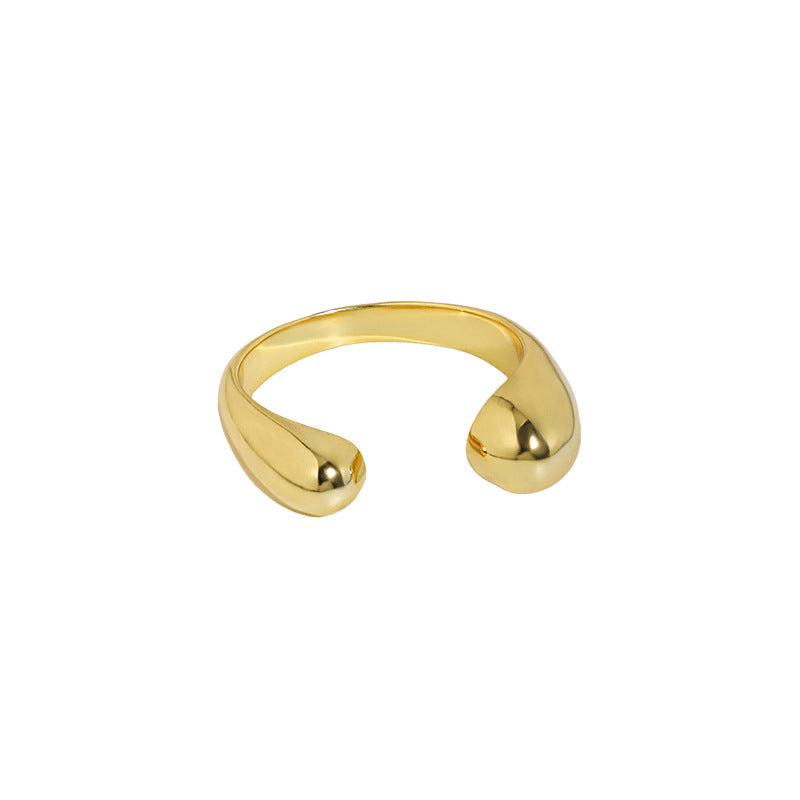Twin Teardrop Open Ring in 925 sterling silver. Two rounded teardrop ends curve towards each other in an open band.